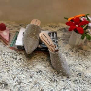 Anne Klein Silver Mules with Sleek Design